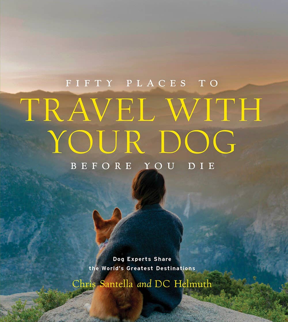 Fifty Places to Travel with Your Dog Before You Die – book cover with a person and dog overlooking mountains