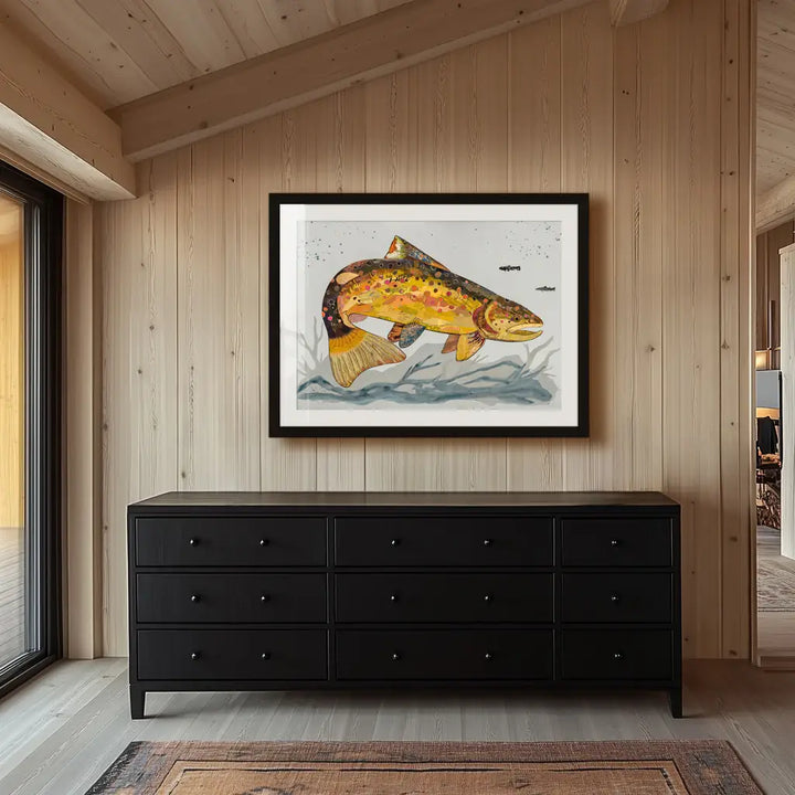 Dolan Geiman Frying Pan Brown Trout Art Print – framed above a dresser in a wood-paneled room